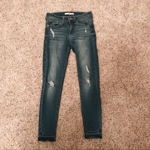 mid rise raw hem jeans